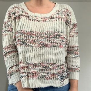 Distressed oversized knit sweater